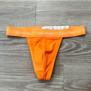 CALVIN KLEIN MEN’S THONG ORANGE MEDIUM